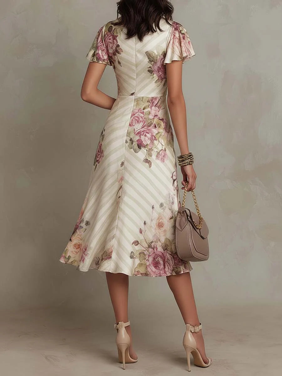 Vestido midi floral satinado elegante