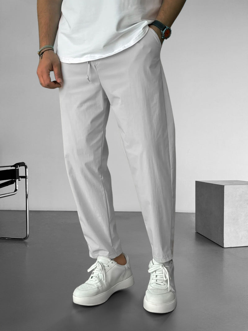 Elegantes pantalones ajustados con cordón