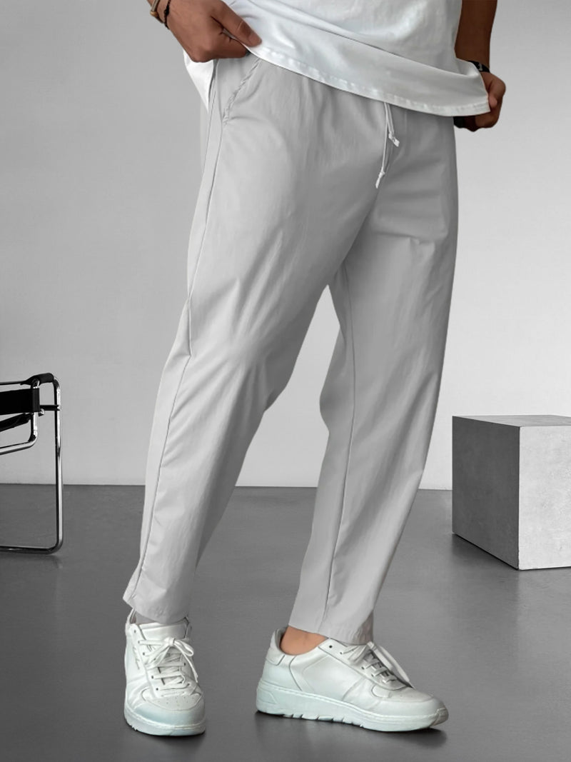 Elegantes pantalones ajustados con cordón