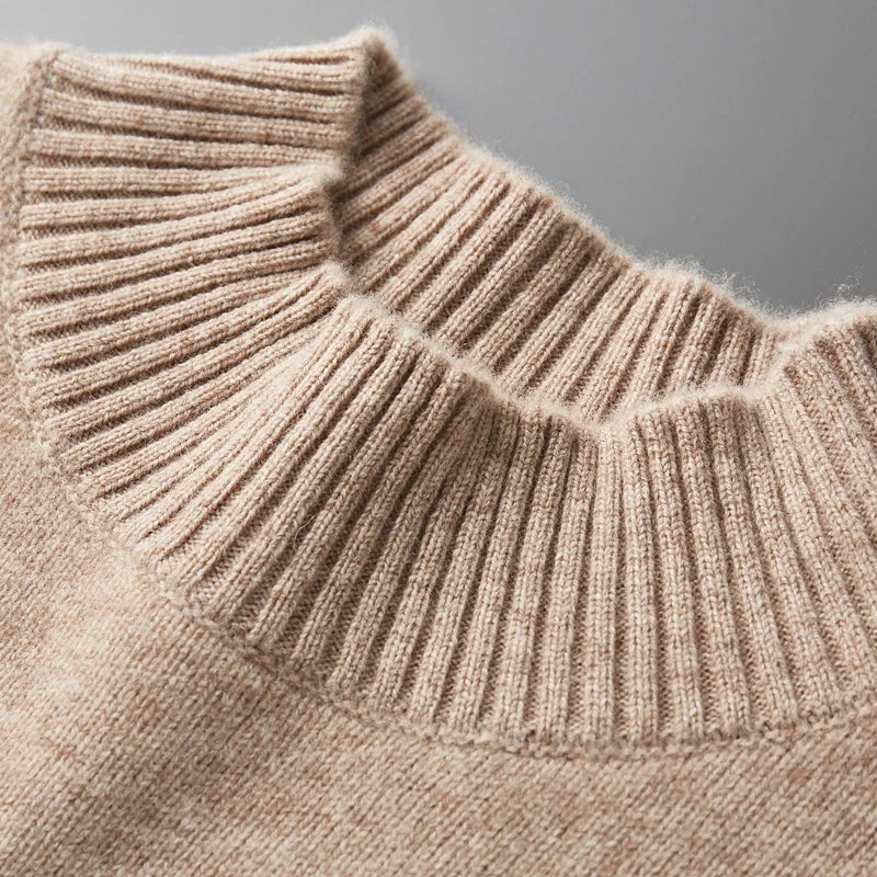 Elegante jersey de cuello alto de lana merino