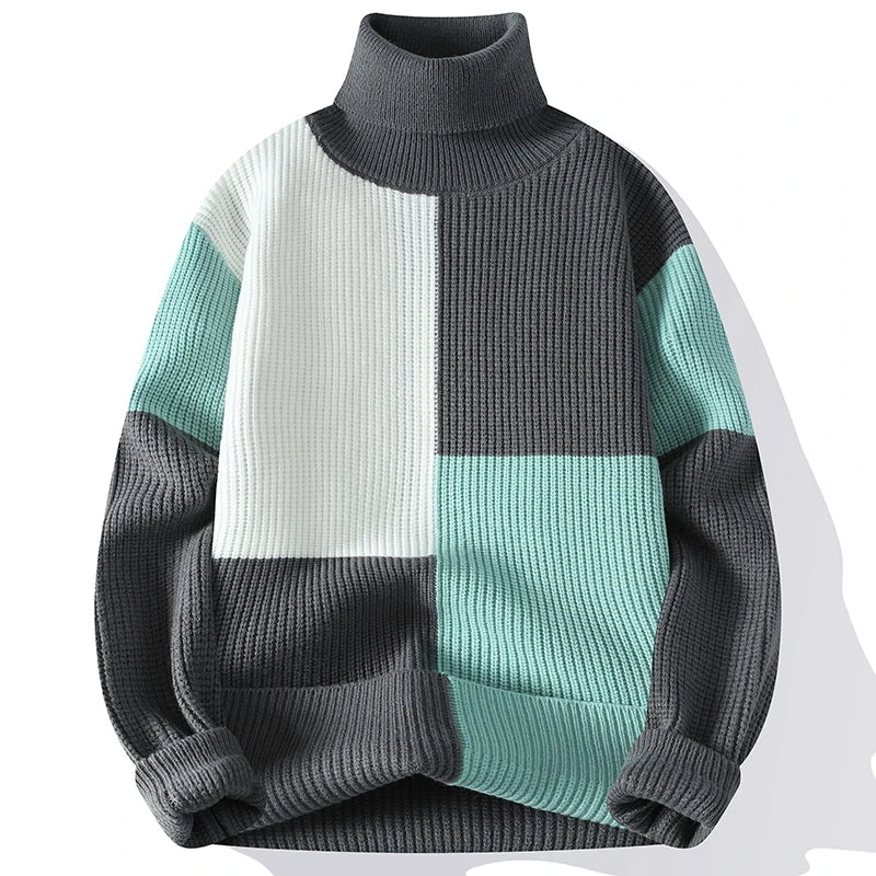 Elegante jersey de cuello alto con diseño patchwork