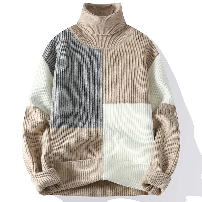 Elegante jersey de cuello alto con diseño patchwork
