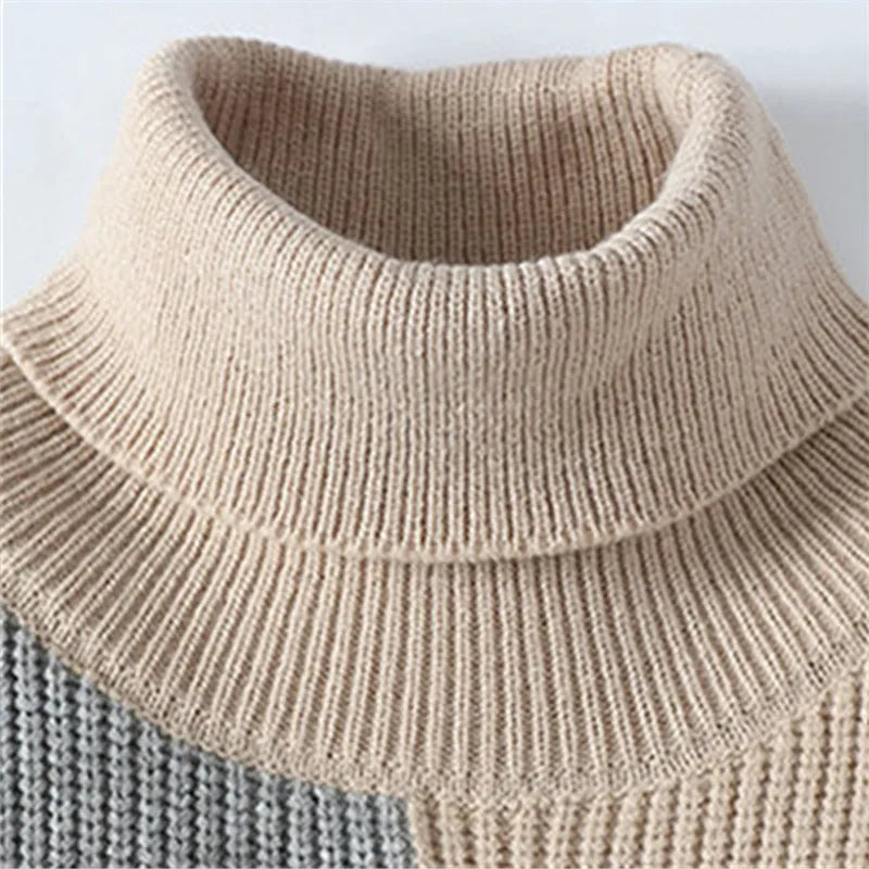 Elegante jersey de cuello alto con diseño patchwork