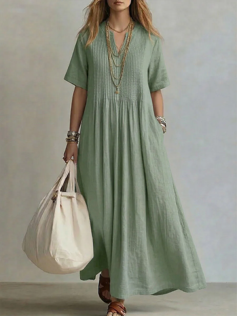 Vestido largo fluido con pliegues