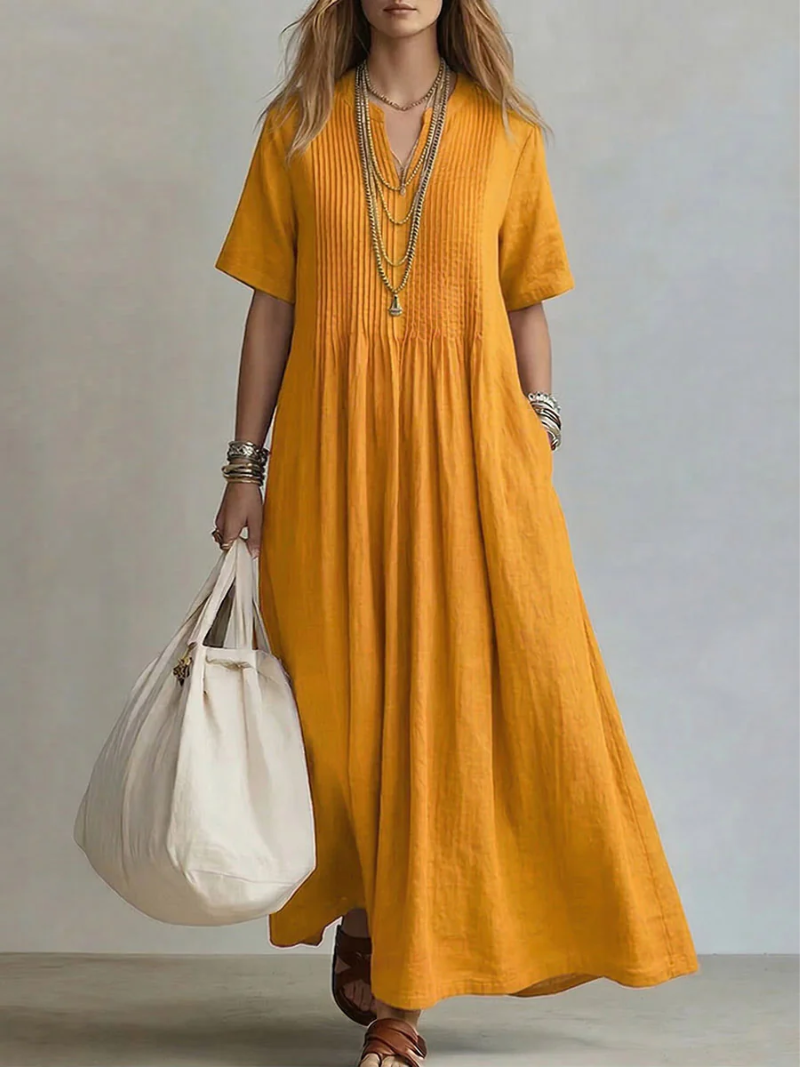 Vestido largo fluido con pliegues